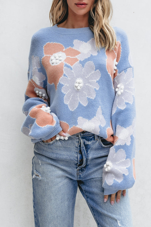 Blanche - Blauer Strickpullover mit Rundhalsausschnitt und Blumenmuster mit hängenden Schultern