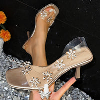 Transparente PVC-Damensandalen mit glänzenden Blumen - Dalia