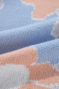 Blanche - Blauer Strickpullover mit Rundhalsausschnitt und Blumenmuster mit hängenden Schultern