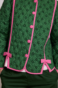 Steppjacke mit Blumenmuster und rosa Schleifen
